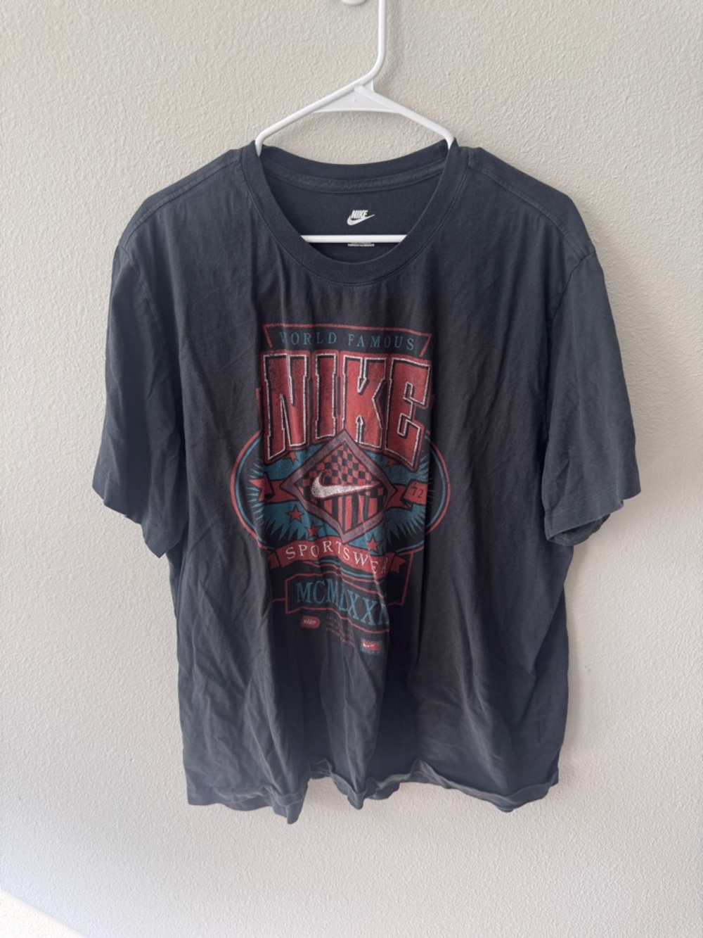 Nike Black Short-Sleeve Graphic Tee with Red and Teal Print